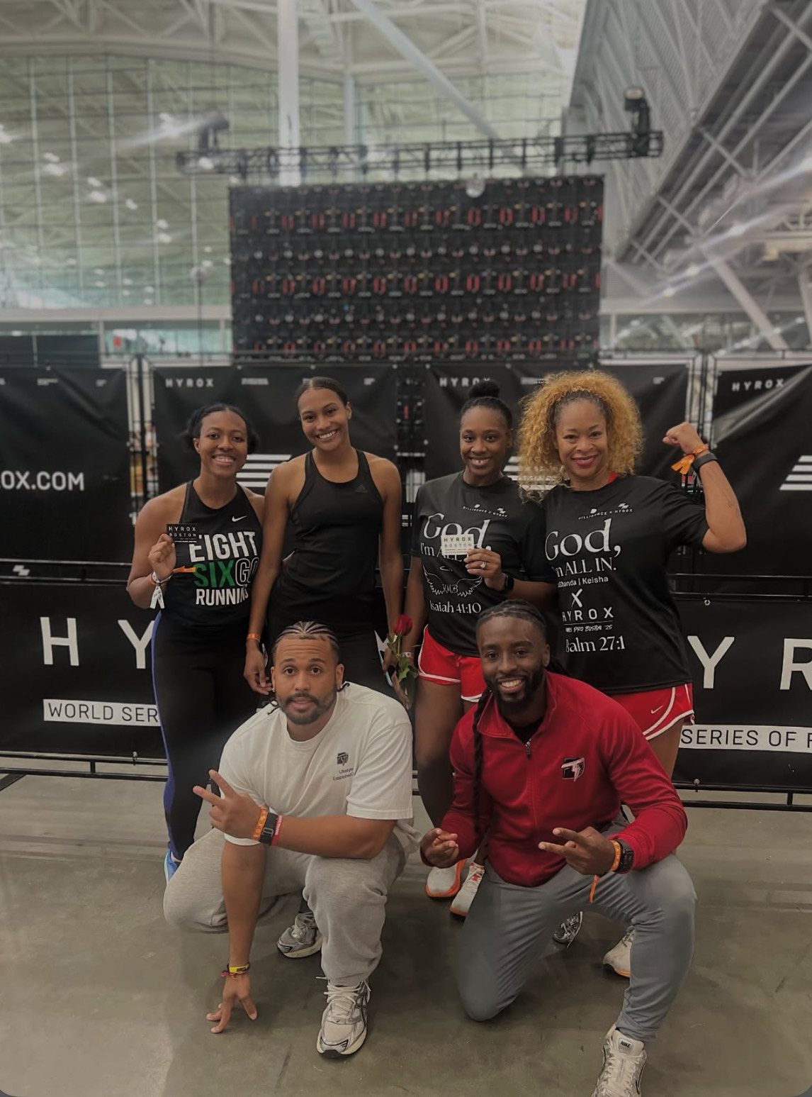 Diverse group of community members at HYROX competition venue