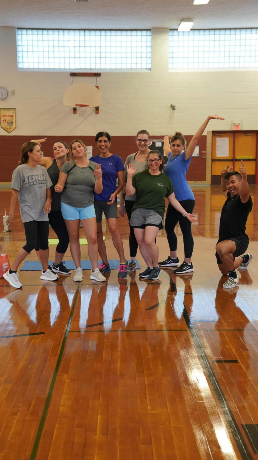 Group wellness program participants engaging in fitness activities